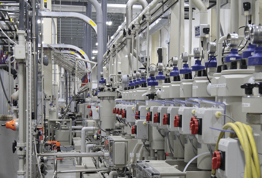 Industrial piping and valve system within a manufacturing facility.